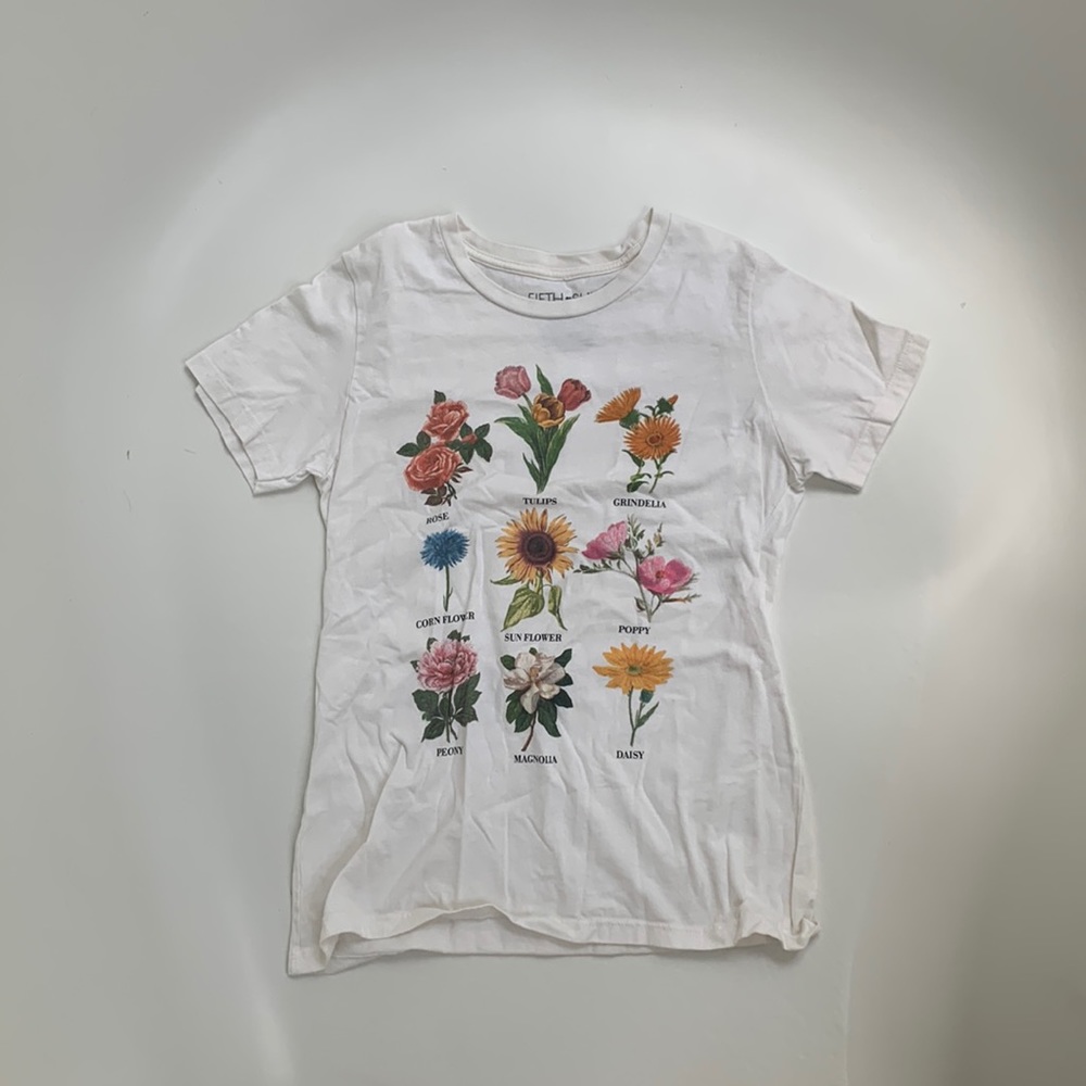Cream Top with flowers. Cute. Fits small.